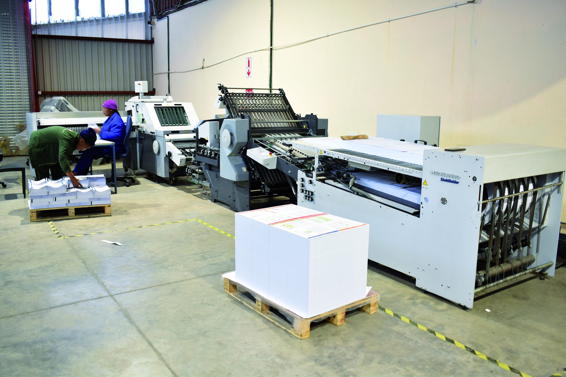 Folding and gathering equipment in the bindery
