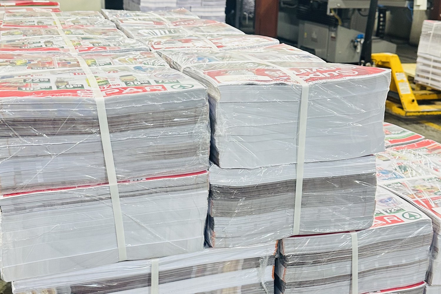 Stacked campaign materials for store delivery