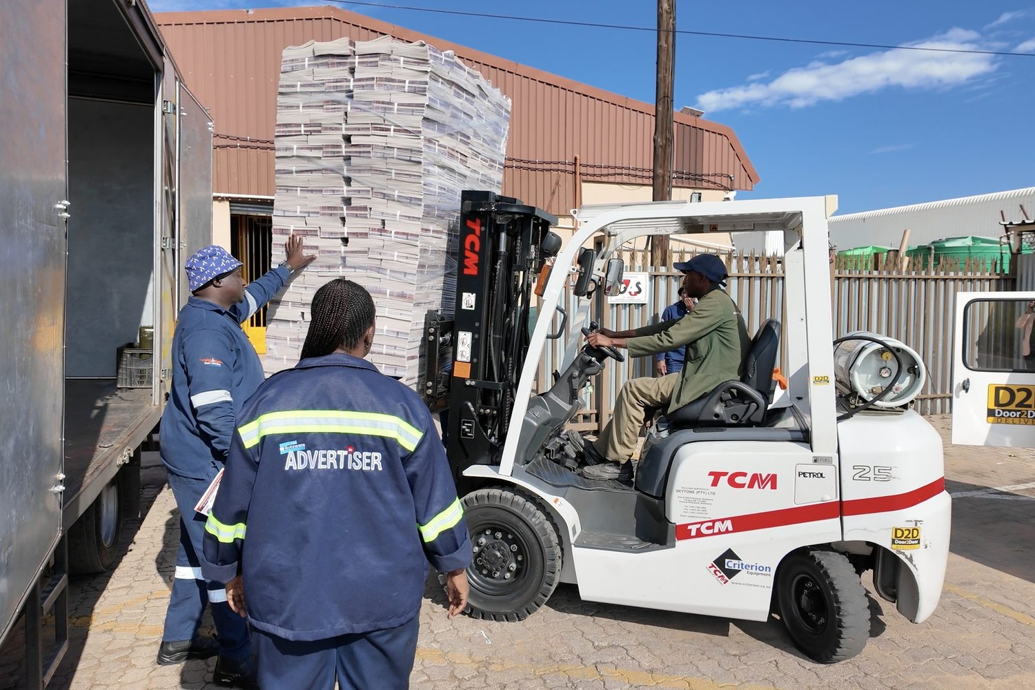 Forklift loading pallets for dispatch