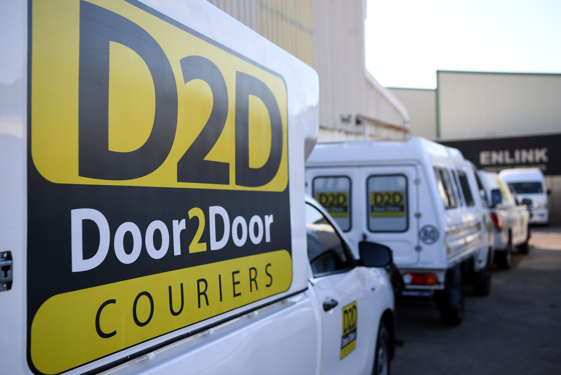 Door2Door Couriers branded delivery vehicles