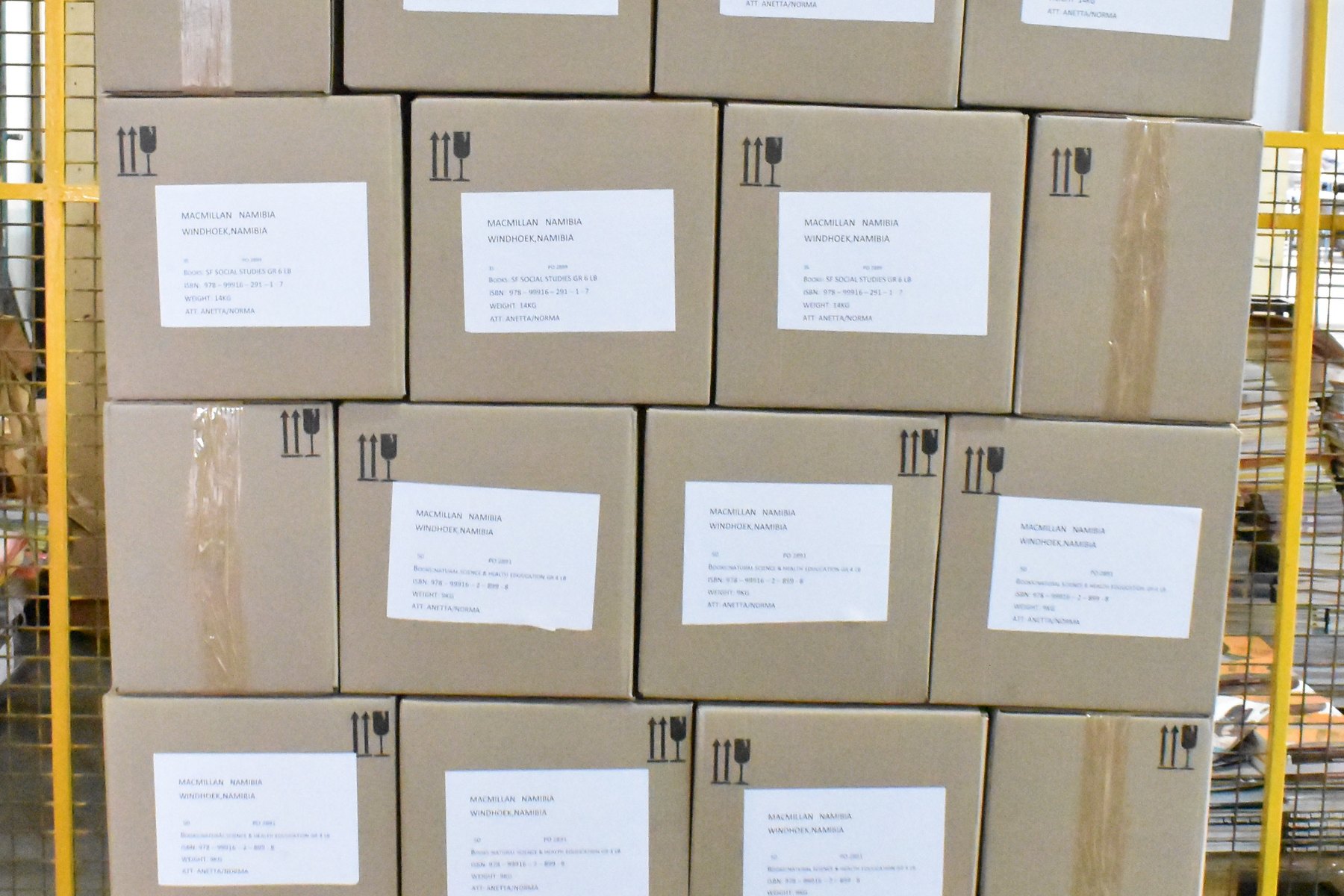 Dispatch team preparing printed stock for delivery