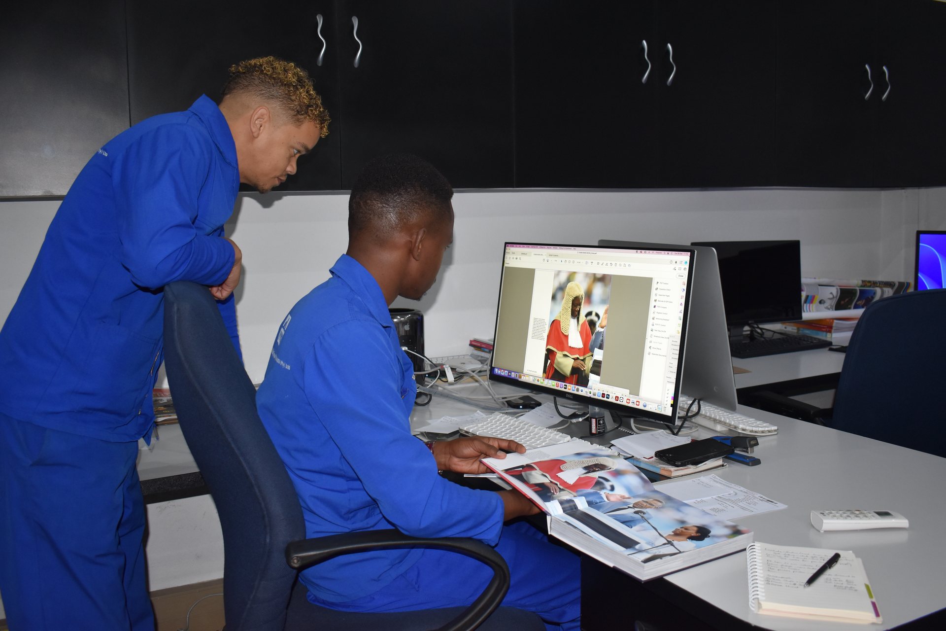Pre-press team preparing a job for plating
